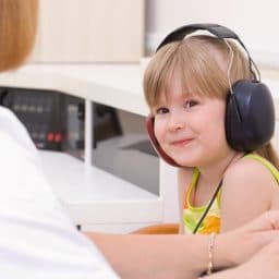 child wearing headphones